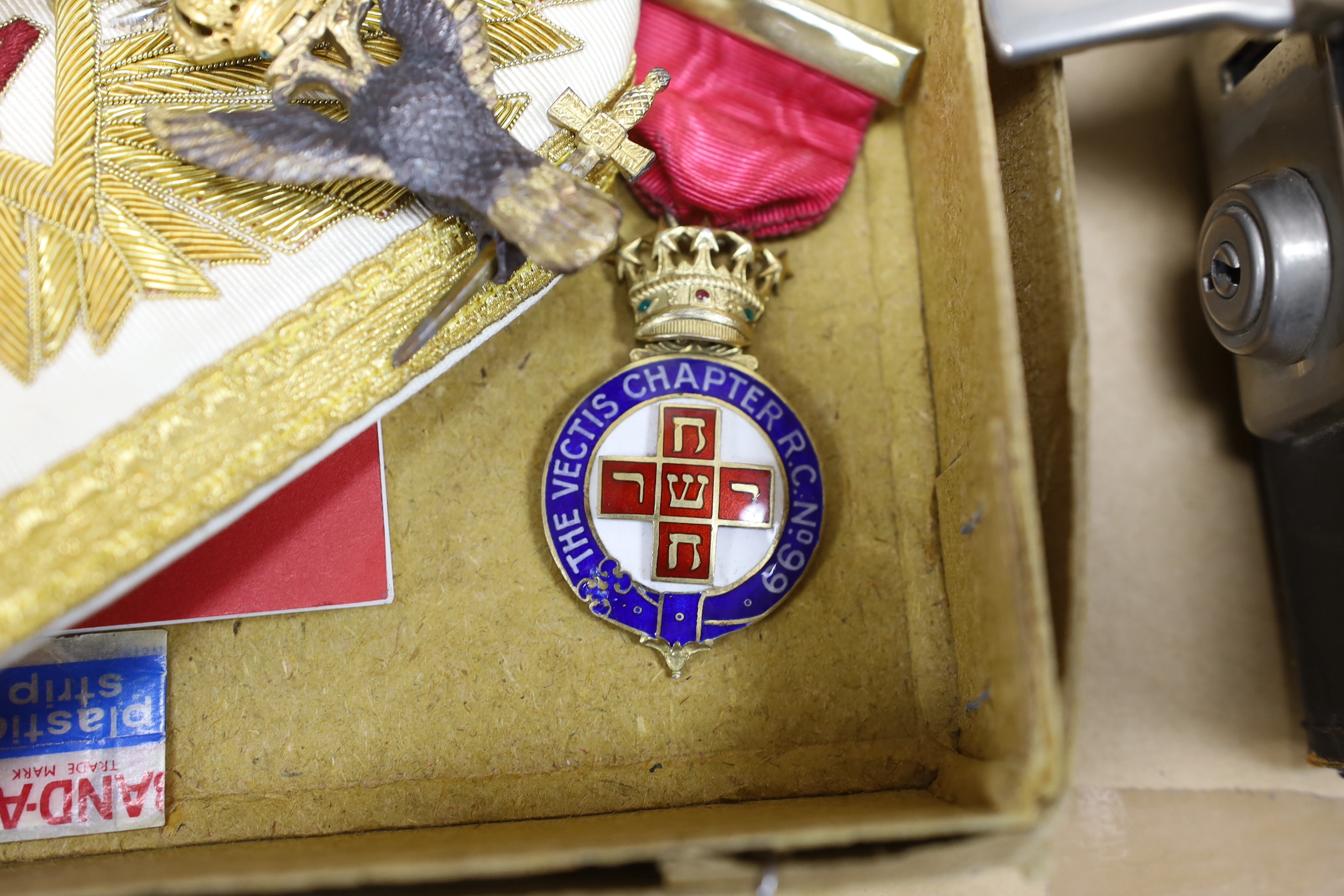 Three boxes of Masonic regalia